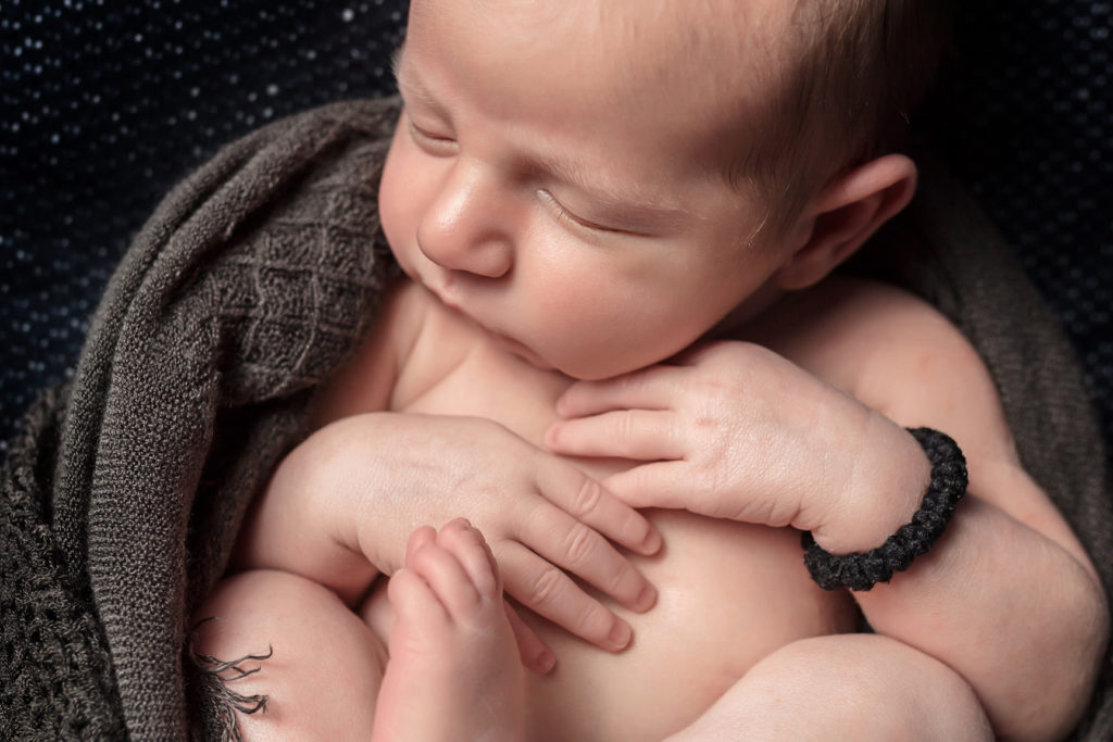 Newborn baby boy, as captured by Lisa from Adelaide Newborn Photography