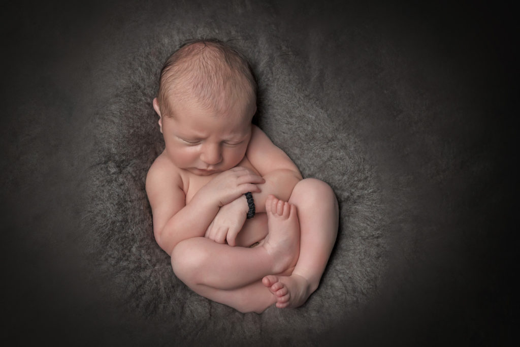 Newborn baby boy, as captured by Lisa from Adelaide Newborn Photography