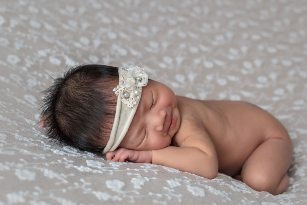 Newborn baby girl, baby smiles, newborn baby